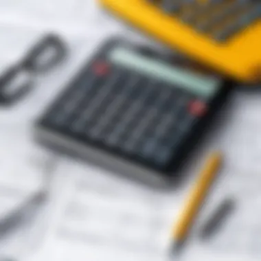 A close-up of construction estimating calculations with a calculator and notepad